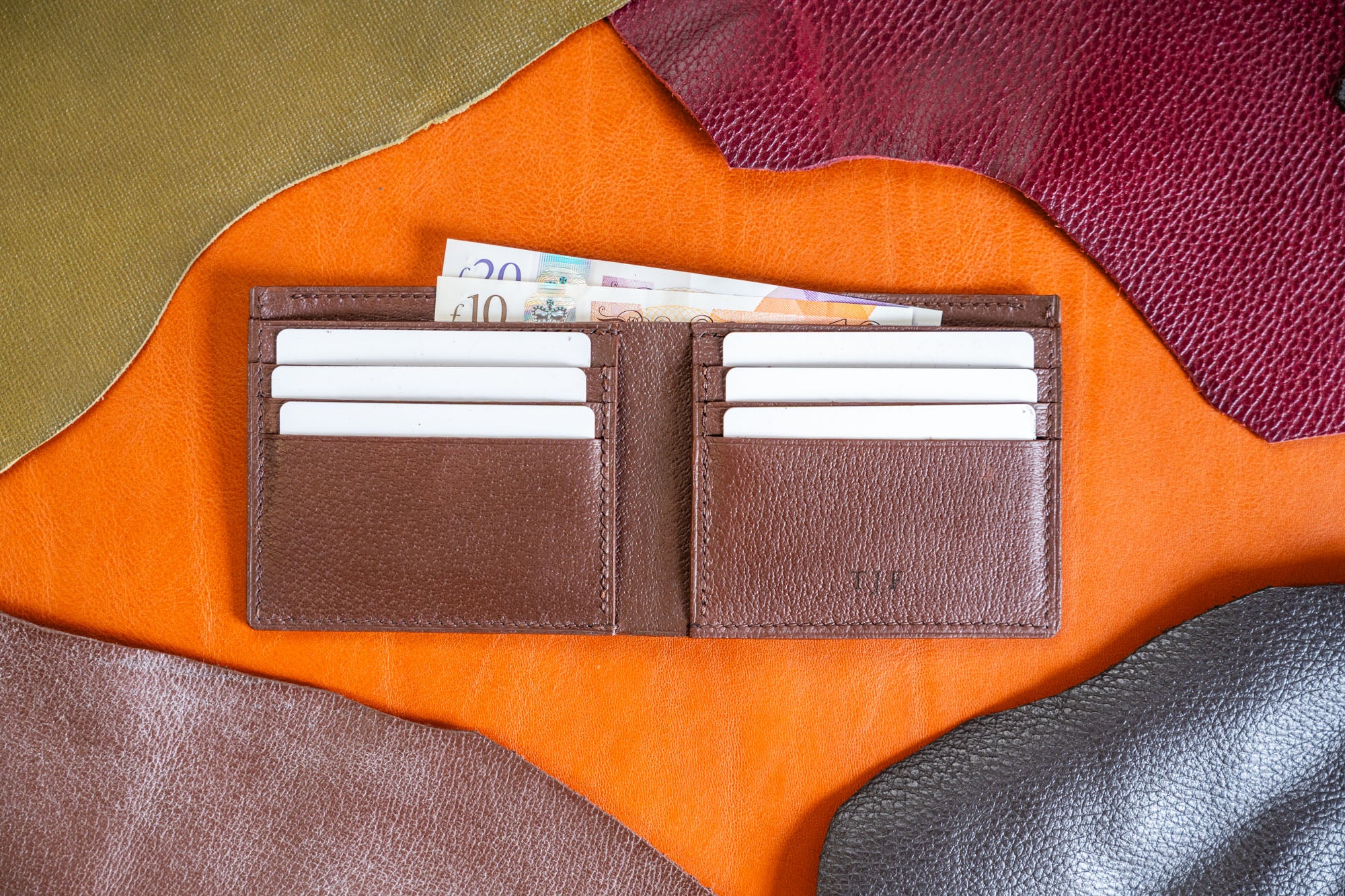 dark brown bifold leather wallet made by hand