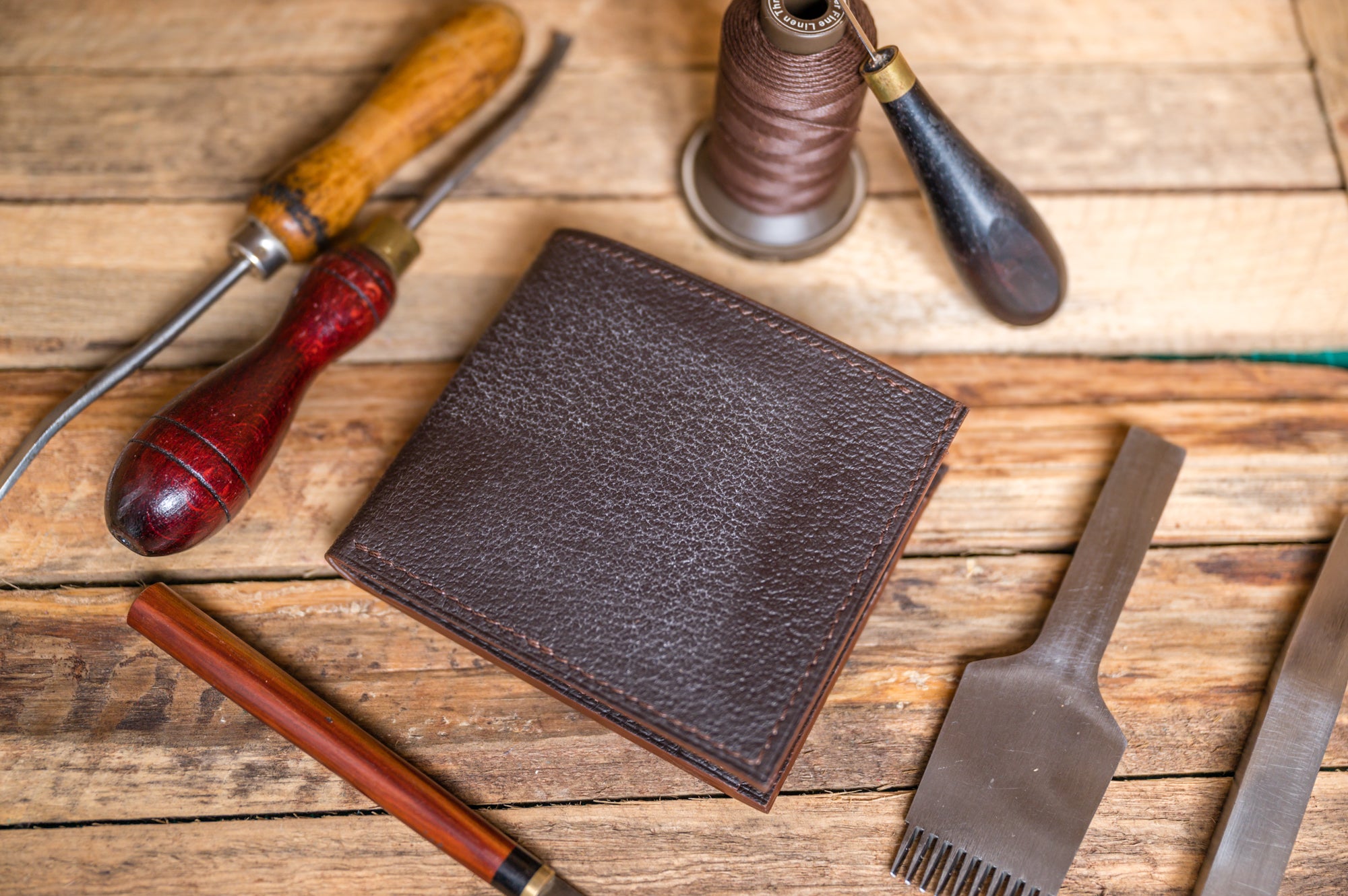 Brown bifold wallet with coin pocket from J.H.Leather
